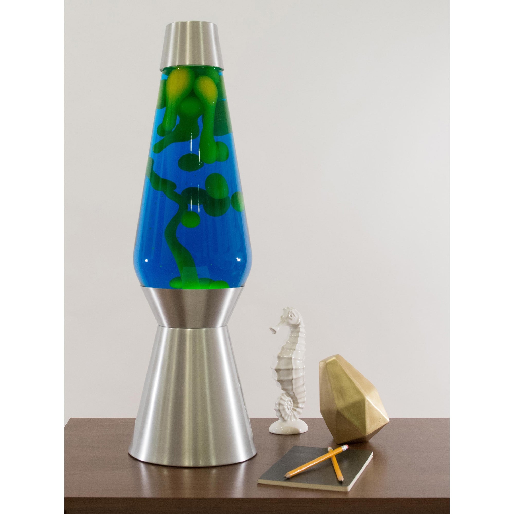27" LAVA� Lamp Grande - Yellow/Blue/Silver on a table towering over knick knacks